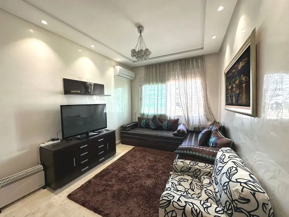 Appartement à louer 11 000 dh 100 m² avec 2 chambres - Souissi Rabat